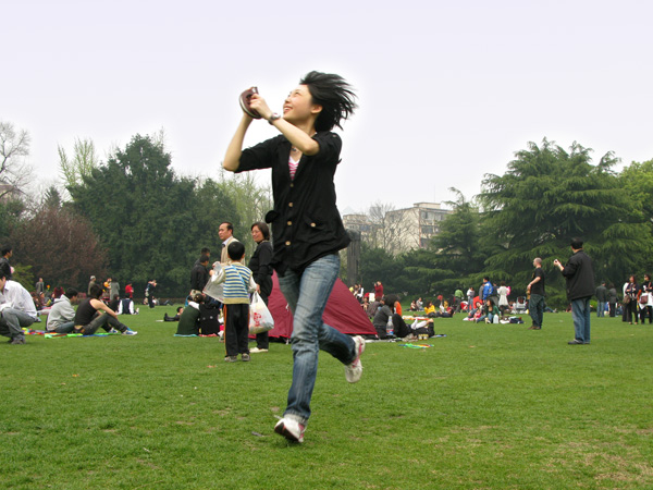 She flies her kite.