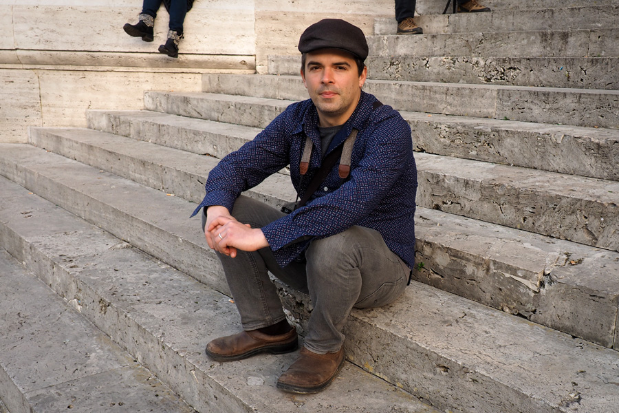 Nik on the steps in front of the Supreme Court building